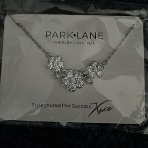 Brand new in package flower necklace